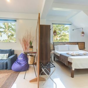 wide angle view of the luxury studio suites at Kalipay Resort Siargao showing the bedroom and living area