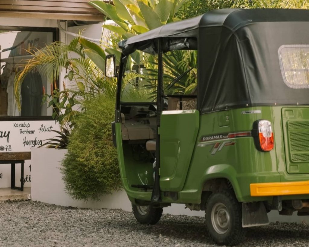 a tuk tuk parked outside Kalipay Resort Siargao available for hire