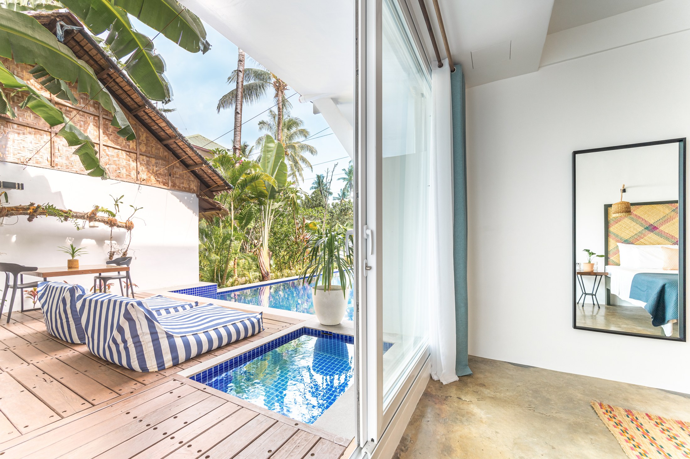 Poolside King Room with Deck and Jacuzzi: view from the bedroom to the private deck